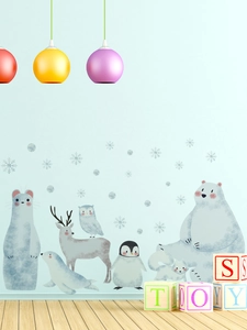 Detail of polar bear and penguin wall stickers for a cozy nursery decoration