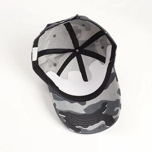 Detailed interior of camo cotton baseball cap with 100% cotton label and reinforced seams