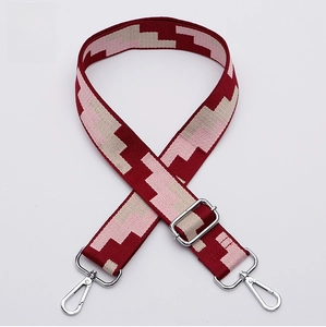 Close-up of No. 317 wide adjustable shoulder strap with silver hooks and geometric patterns