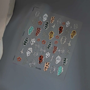 Detailed sheet of animal print nail art stickers featuring leopard and zebra textures