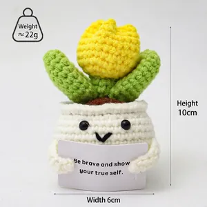 Handmade crochet sunflower with motivational card saying Be Brave on a white base
