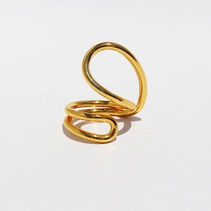Artistic gold twisted geometric line ring with high-gloss finish on white background
