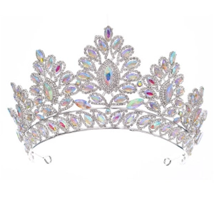 Macro detail of silver baroque crown with iridescent AB crystals and teardrop gems