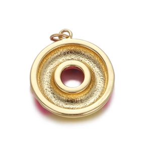 Close-up of a gold-plated circular donut pendant with polished concentric ring design