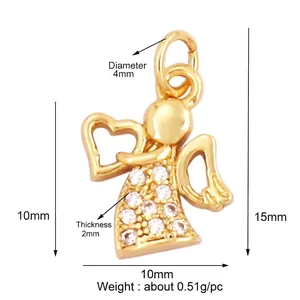 Detailed view of a gold angel charm with zircons and precise dimension measurements