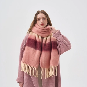 Stylish pink gradient knit scarf for women with soft fringe edges for winter warmth