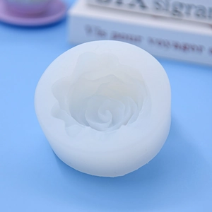 White rose shaped silicone mold for DIY cake baking and candle making shown from top view