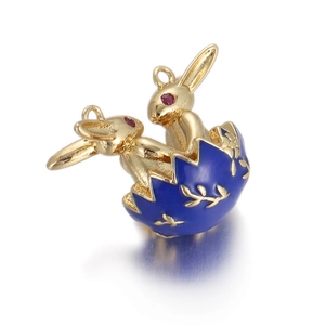 Detail of golden rabbits in blue enamel egg pendant with intricate floral patterns