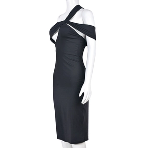 Close-up of black bodycon dress featuring hollow-out slanted neckline and shoulder detail