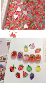 Close-up of 3D fruit resin nail charms showing translucent watermelon and peach details