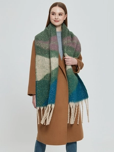 Detail of color-block scarf with thick tassels in green, blue and purple mohair style