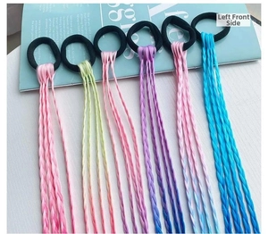 Detailed close-up of six colorful synthetic braided hair extensions with elastic bands