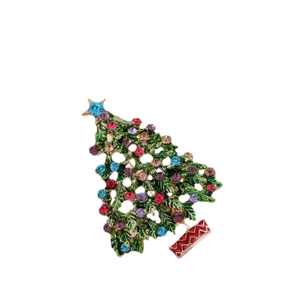 Elegant Christmas tree brooch with green metal and colorful rhinestones on white backdrop