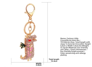 Porte-clés crocodile en strass rose et or rose avec dimensions détaillées