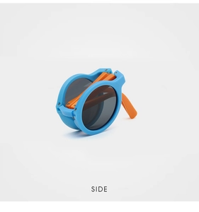 Detailed side view showing the portable foldable blue and orange frame kids sunglasses