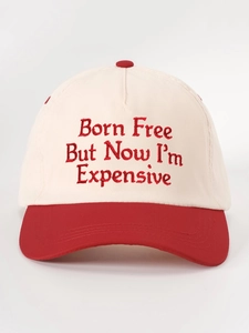 Detail of Born Free embroidery on cream and red contrast panel cotton baseball cap