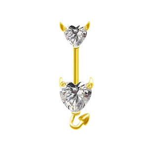 Détail d'un piercing de nombril cœur diable doré avec zircone et petite queue arquée