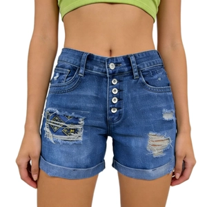 Detailed view of the multi-button fly and distressed frayed hem on blue denim shorts