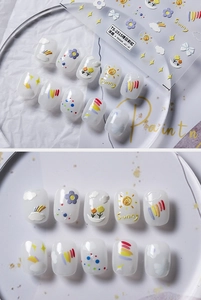 Macro detail of 3D embossed rainbow and sunny flower nail art stickers TS-2515