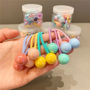Detailed view of high elastic candy color hair ties with glossy beads for girls