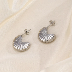 French vintage silver stainless steel geometric shell stud earrings on silk fabric