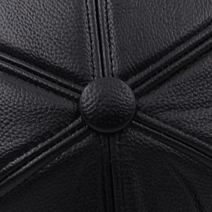 Black leather flat top winter hat for men featuring premium stitched stitching and ear flaps