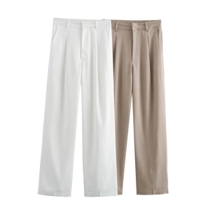 Detail of high-waisted straight-leg trousers in white and khaki with premium drape finish