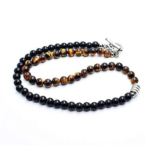 Detail of 6mm tiger eye and obsidian beaded necklace with stainless steel OT clasp