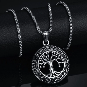 Silver tree of life pendant necklace with woven border and box chain on leather