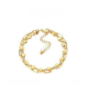 Detail view of adjustable stainless steel double chain bracelet with heart charm