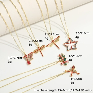 Classic 18K gold plated necklaces with star and dragonfly zircon pendants on white background