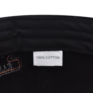 Close-up of internal cotton sweatband and wash label showing 100% cotton material