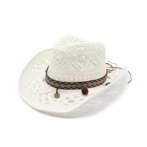 White woven hollow western cowboy hat with ethnic band and vintage metal pendants