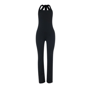 Close-up of black halter neck jumpsuit featuring a cross neckline and slim fit design
