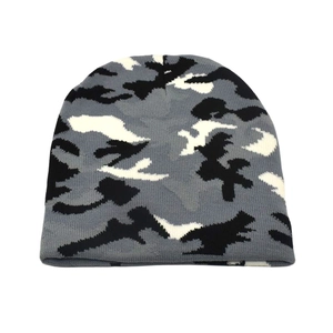 Detail shot of grey camouflage knitted beanie showing soft fabric texture on white background