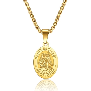 Gold Saint Michael medallion necklace with box chain and protective relief carving