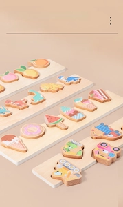 Educational wooden puzzle set featuring fruit, dinosaur, dessert and vehicle themes
