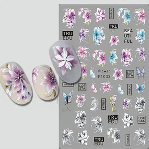Close-up of F1033 nail art stickers featuring watercolor tulips and butterfly designs
