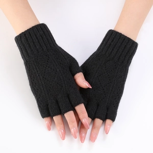 Close-up of black diamond-pattern knit fingerless arm warmers with thumb hole detail