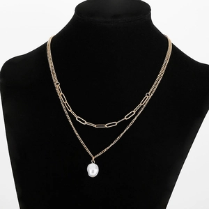 Double-layered gold titanium steel necklace with textured links and baroque pearl pendant