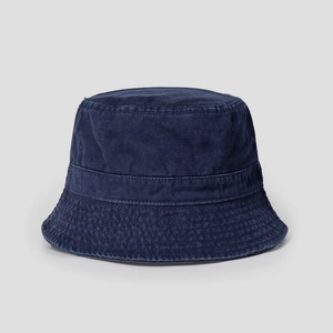 Detailed view of dark blue washed cotton bucket hat with reinforced stitching on the brim