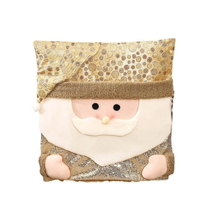 Golden sequin Santa Claus chair cover with plush trim for elegant Christmas dining decor
