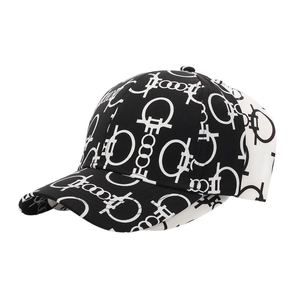 Detail view of cotton baseball cap with digital geometric patterns and curved brim