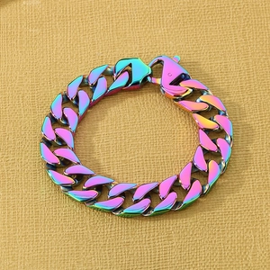 Close-up of rainbow gradient stainless steel Cuban chain bracelet with lobster clasp