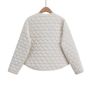 Beige quilted jacket featuring heart-shaped stitching pattern on the back view