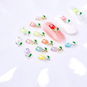 Colorful tulip-shaped alloy nail charms with gold and silver plating on white background