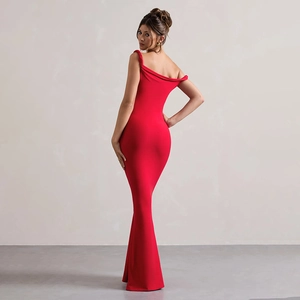 Detail of elegant red off-the-shoulder fishtail evening gown showing slimming fit and drape