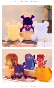 Macro shot of Halloween resin molds featuring pumpkin, ghost, and skull shapes for DIY crafts