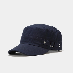 Detail of navy blue cotton patrol cap featuring adjustable silver metal side buckles