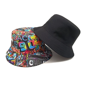 Reversible bucket hat set with minimalist black design and 90s vintage graffiti print